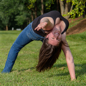 Nicole doing "wildthing" yoga pose